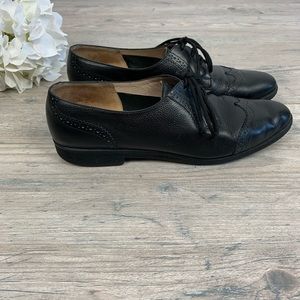 Salvatore Ferragamo black wing tips oxfords